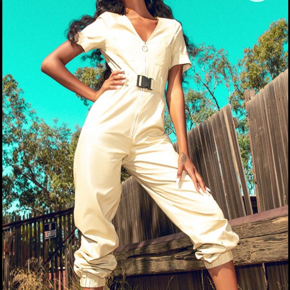 Light tan utility jumpsuit.